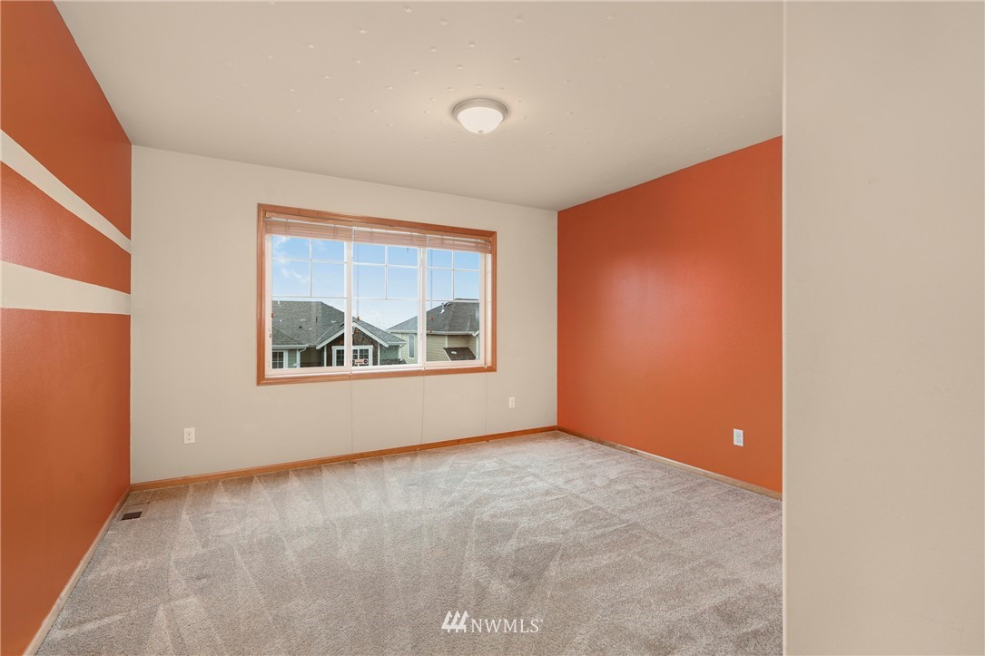 3616 Mill Place South Renton, WA 98055 - Photo 14 of 25 a view of an empty room with a window