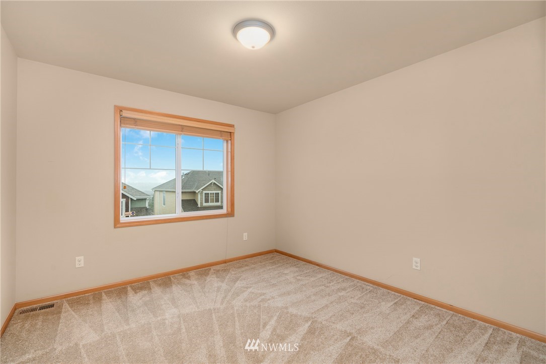 3616 Mill Place South Renton, WA 98055 - Photo 15 of 25 an empty room with windows