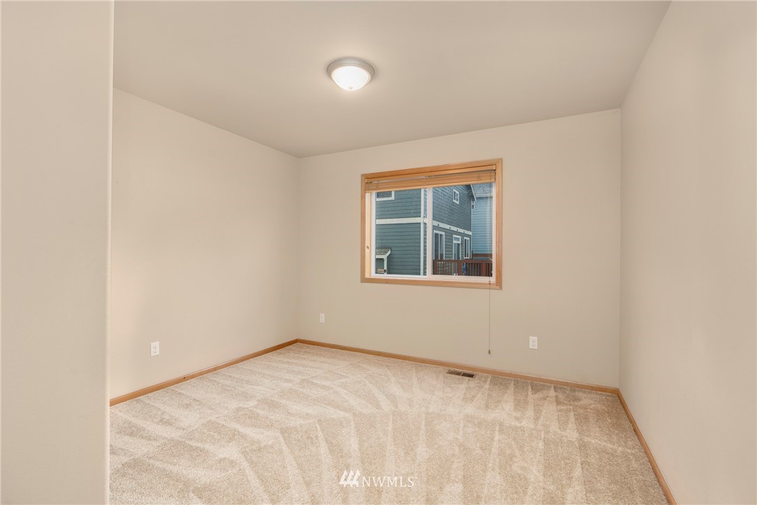 3616 Mill Place South Renton, WA 98055 - Photo 16 of 25 an empty room with windows