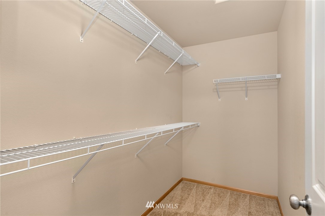 3616 Mill Place South Renton, WA 98055 - Photo 20 of 25 a view of a room with racks on the wall