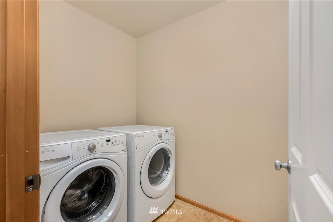 3616 Mill Place South Renton, WA 98055 - Photo 23 of 25 a utility room with dryer and washer