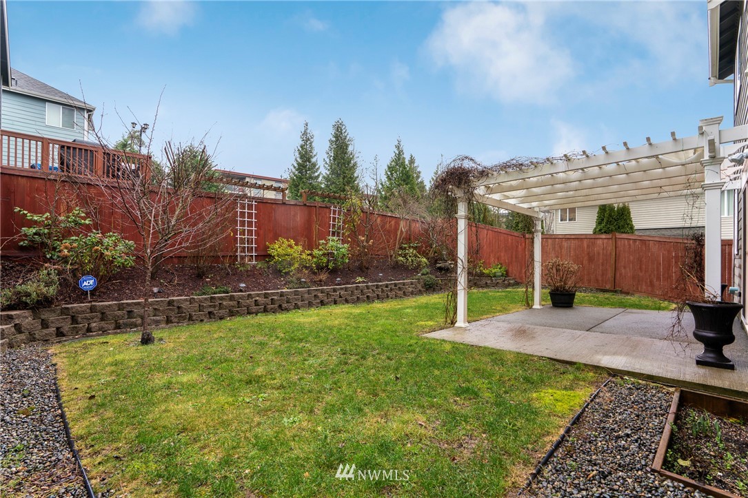 3616 Mill Place South Renton, WA 98055 - Photo 24 of 25 a view of a backyard with a garden