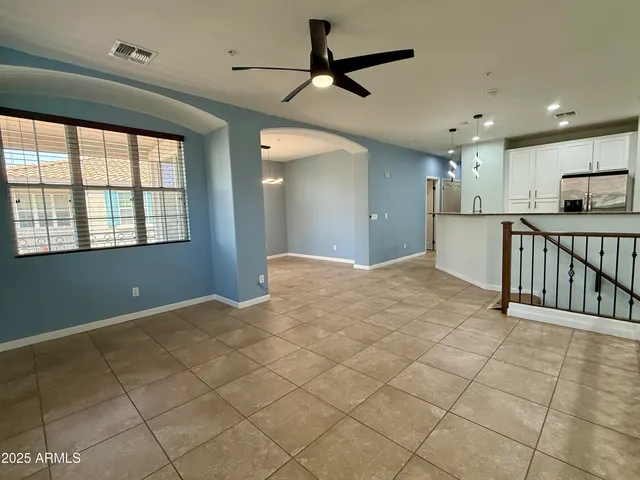 a view of a kitchen with windows
