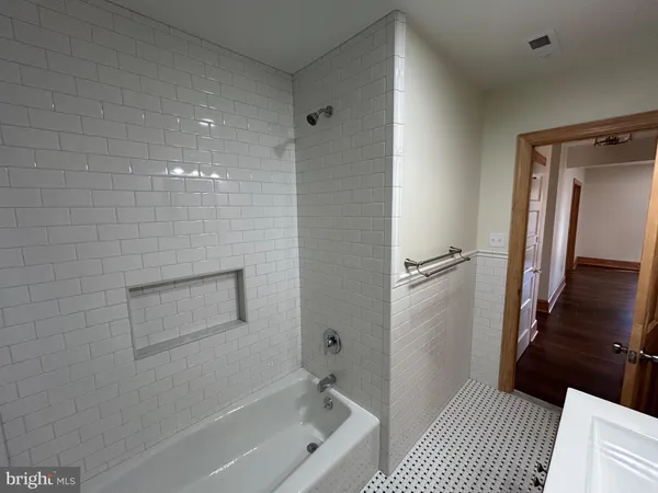 a bathroom with a sink a vanity and a mirror