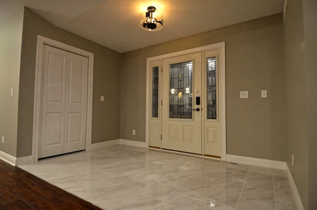 wooden floor and window in a room