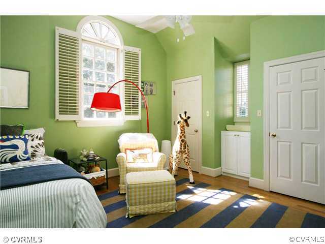 8401 River Road Richmond, VA 23229 - Photo 18 of 25 a bedroom with a bed and wooden floor