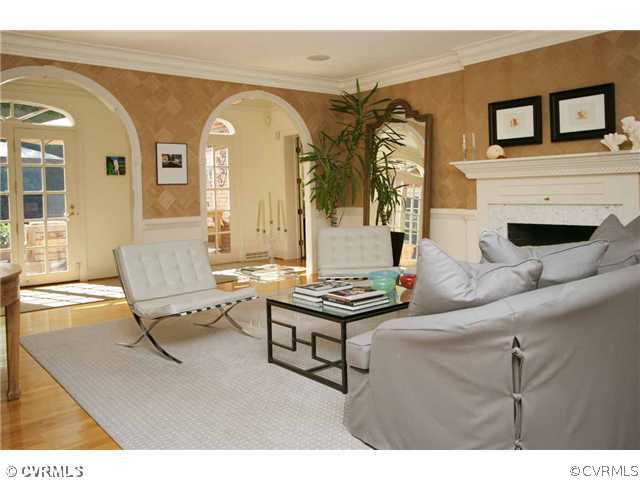 8401 River Road Richmond, VA 23229 - Photo 4 of 25 a living room with furniture and a fireplace