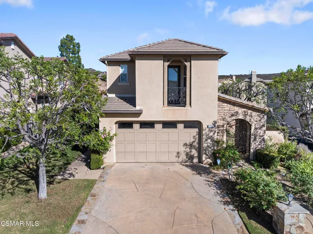 a house view with a outdoor space