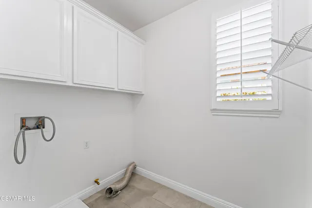 a bathroom with a window and a window