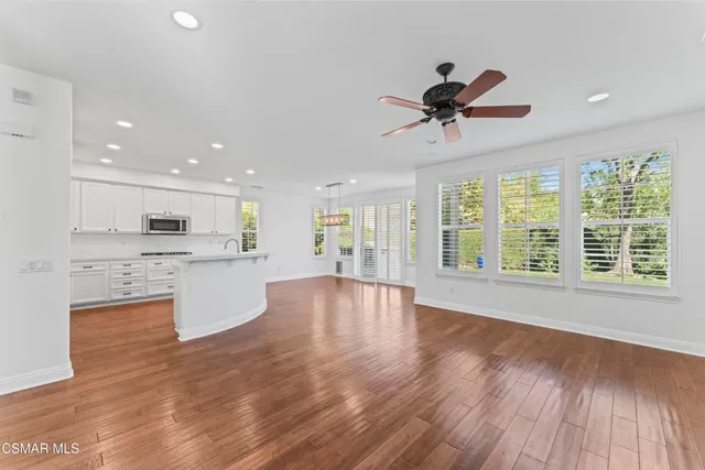 a view of a kitchen with a sink and a kitchen view