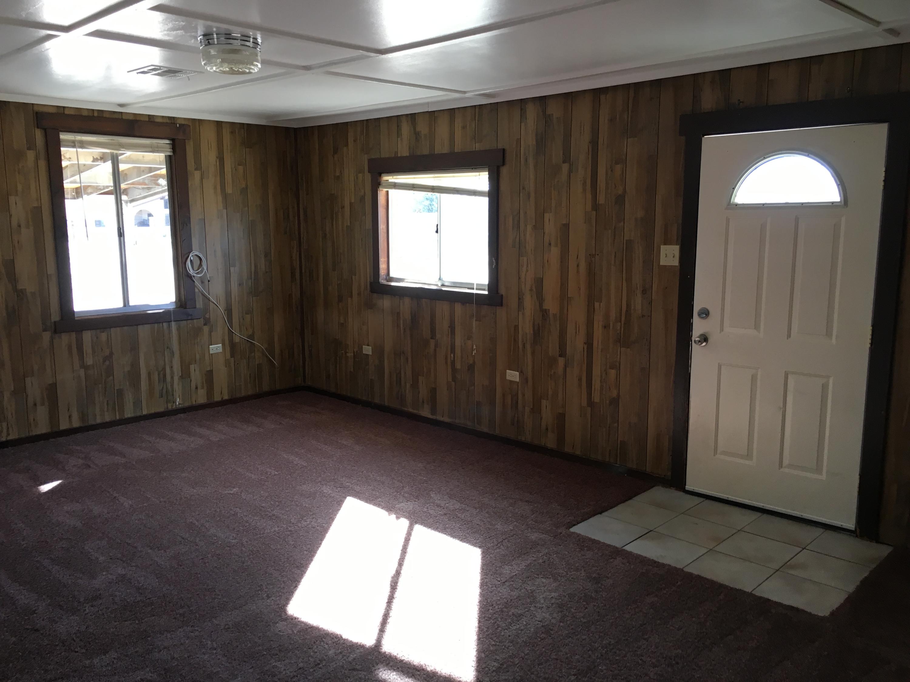 43254 52nd Street West Lancaster, CA 93536 - Photo 15 of 18 an empty room with a window