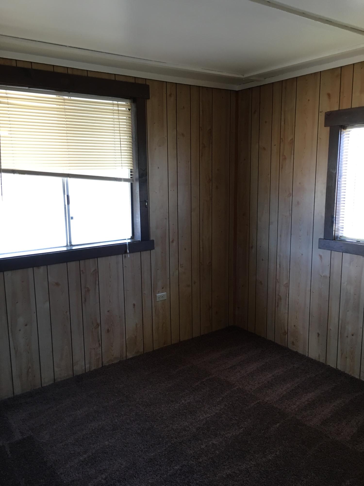 43254 52nd Street West Lancaster, CA 93536 - Photo 17 of 18 an empty room with windows