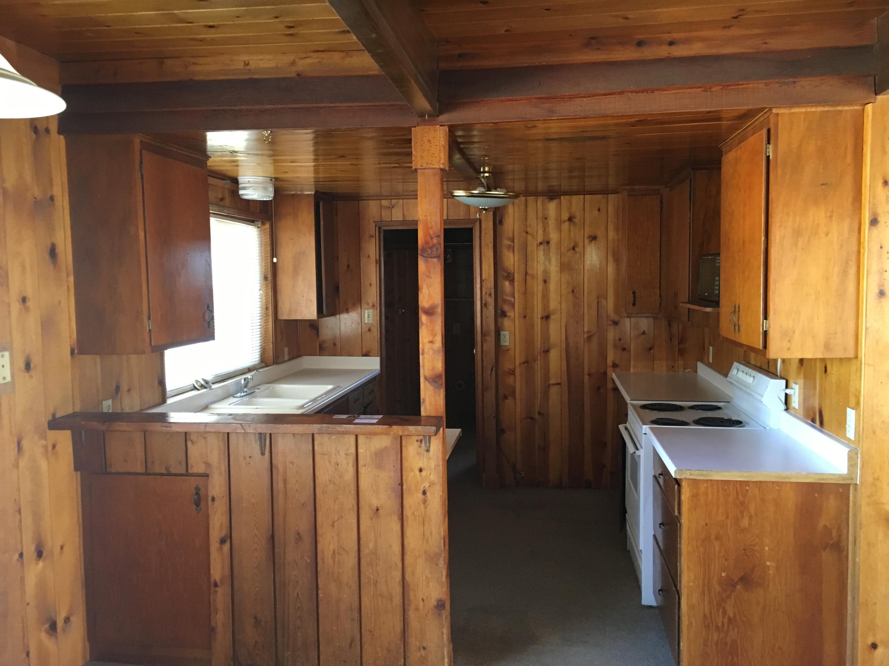 43254 52nd Street West Lancaster, CA 93536 - Photo 3 of 18 a bathroom with a granite countertop sink and a mirror