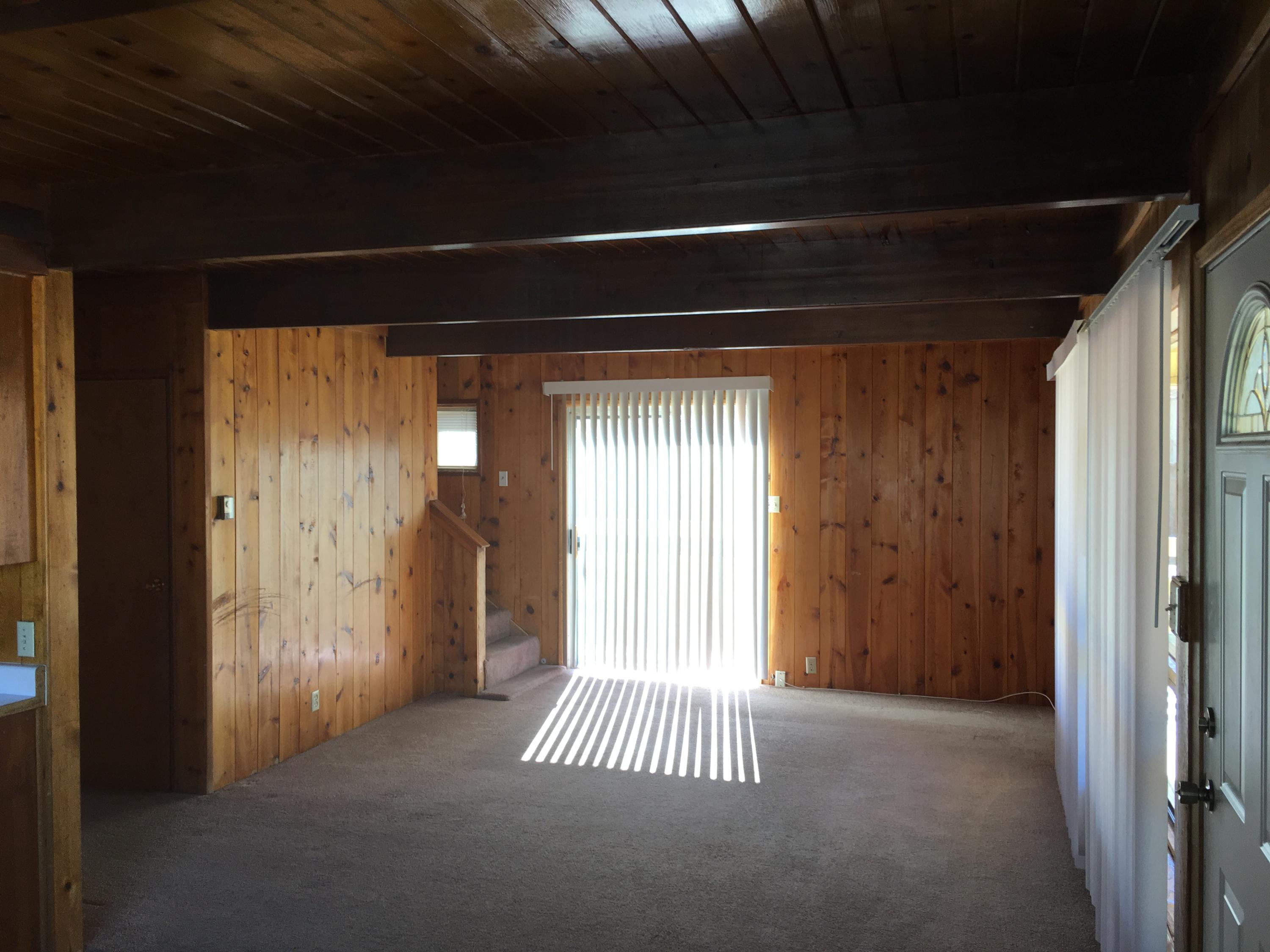 43254 52nd Street West Lancaster, CA 93536 - Photo 4 of 18 a view of a room with wooden floor and windows