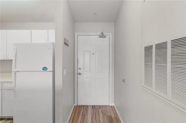 a view of a livingroom with wooden floor