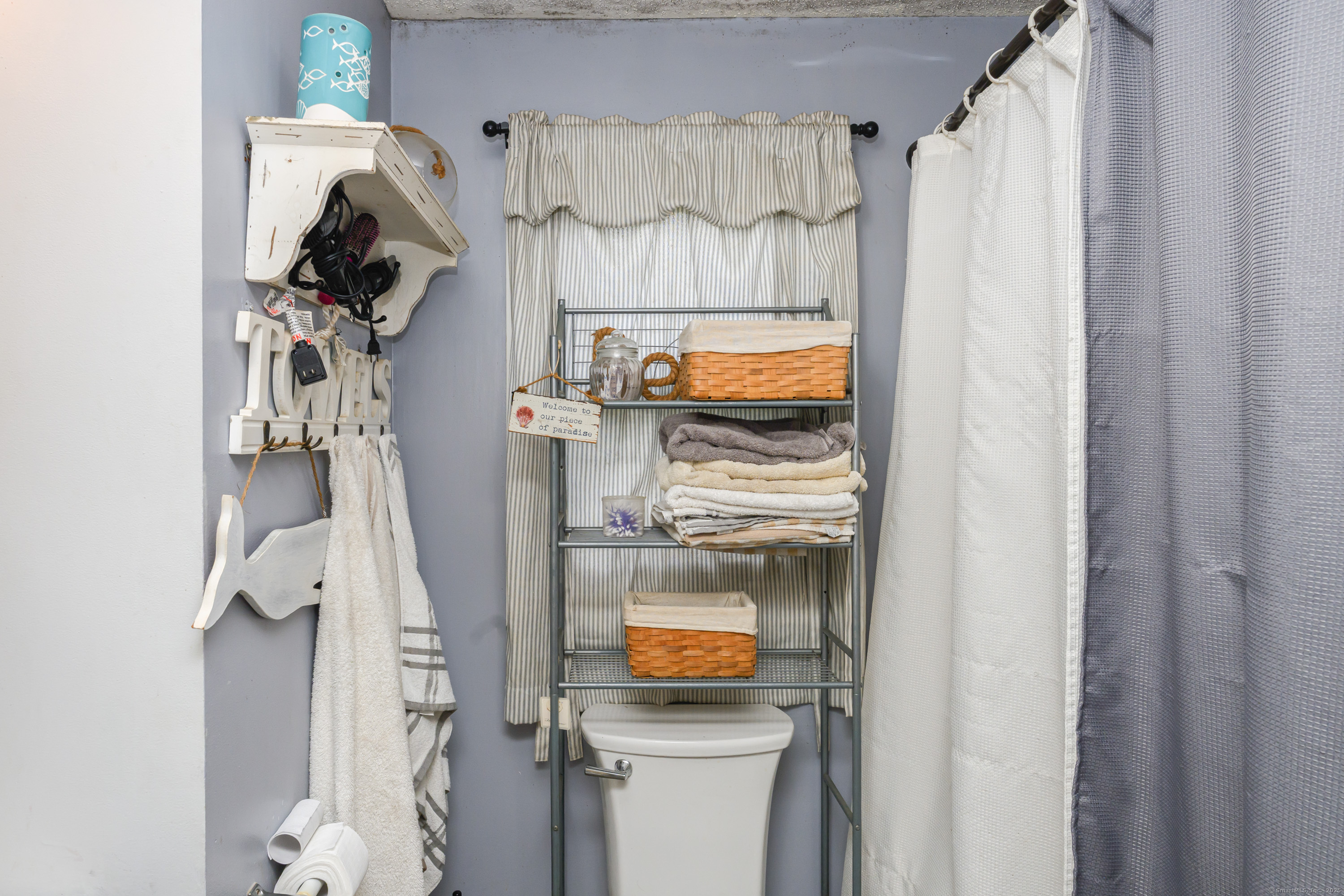 80 Old Plains Road Windham, CT 06226 - Photo 13 of 19 a view of walk in closet with clothes and shoes