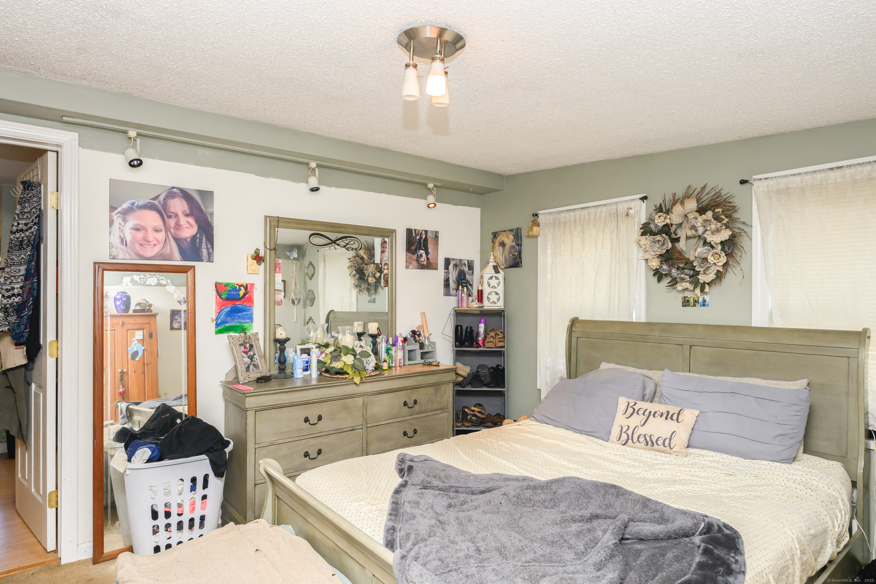 80 Old Plains Road Windham, CT 06226 - Photo 8 of 19 a bedroom with a bed a couch and dresser