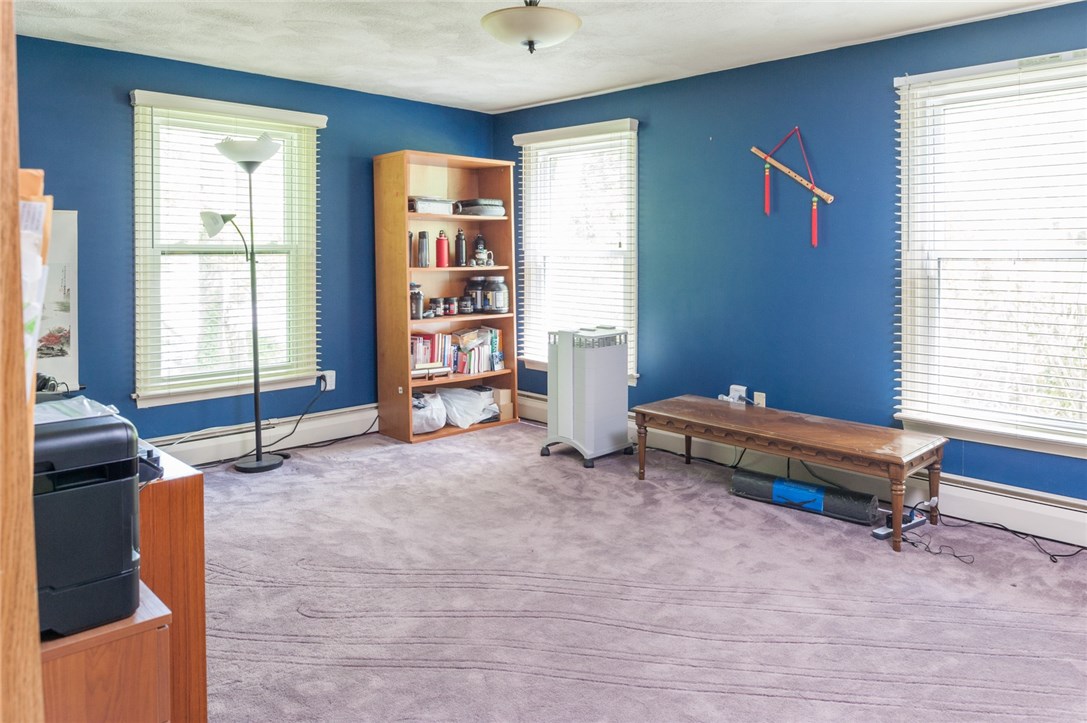 2097 Middle Road East Greenwich, RI 02818 - Photo 14 of 29 This large first floor room has been used for a variety of purposes.....a home office, a playroom or a second family room.