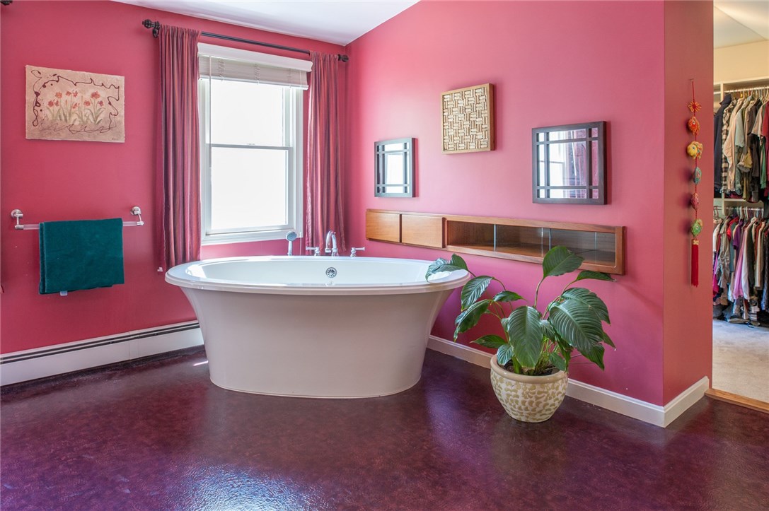 2097 Middle Road East Greenwich, RI 02818 - Photo 18 of 29 The large Master bathroom offers a fabulous deep soaking tub. A nice way to relax after a stressful day! Enjoy the spacious walk-in closet off of the bathroom.