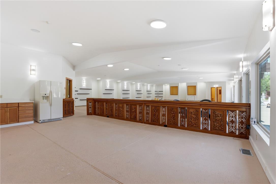 6271 Batman Road Zionsville, PA 18092 - Photo 35 of 100 A spacious, naturally illuminated room featuring warm wood accents and contemporary recessed lighting.