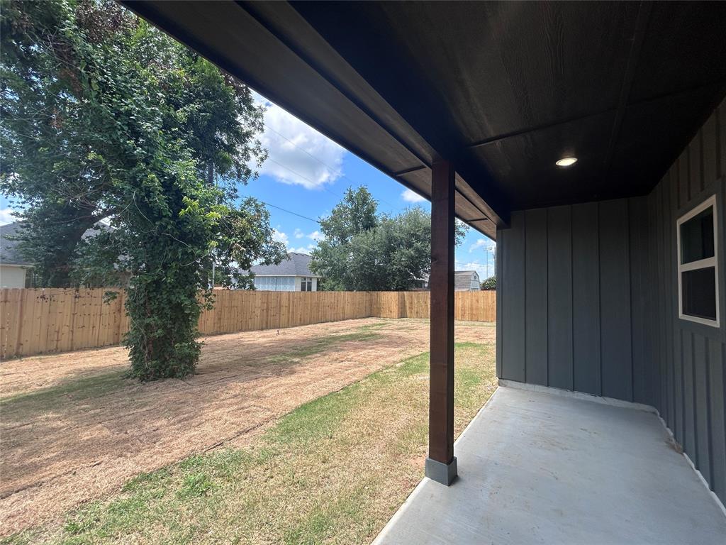 2110 Ridgewood Drive Bridgeport, TX 76426 - Photo 29 of 34 Fenced backyard featuring a patio area