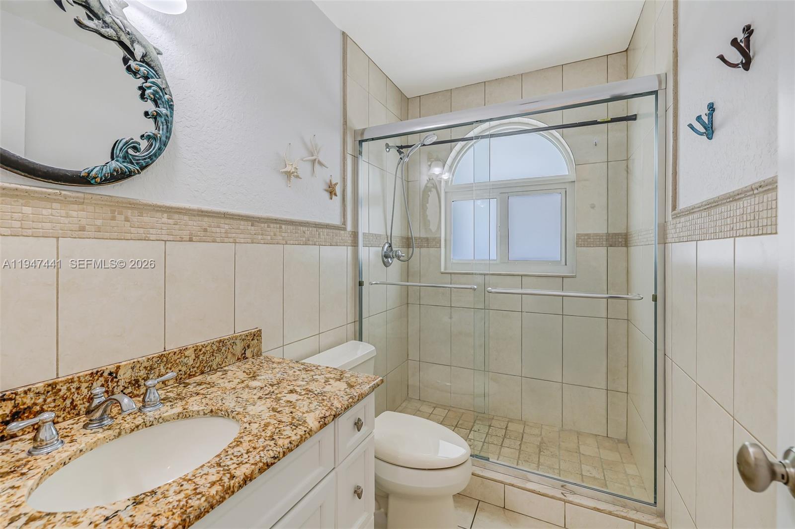 21 Mangrove Lane Key Largo, FL 33037 - Photo 19 of 48 a bathroom with a sink and a mirror