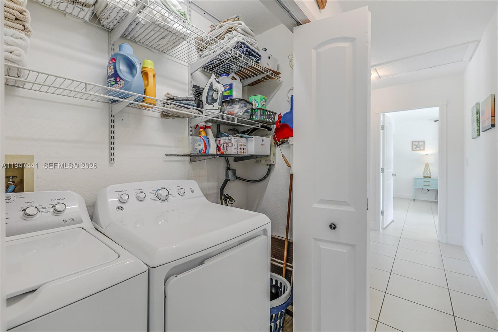 21 Mangrove Lane Key Largo, FL 33037 - Photo 23 of 48 a utility room with dryer and washer