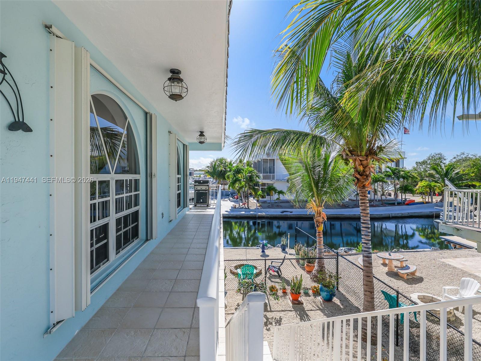 21 Mangrove Lane Key Largo, FL 33037 - Photo 32 of 48 a view of house with outdoor space