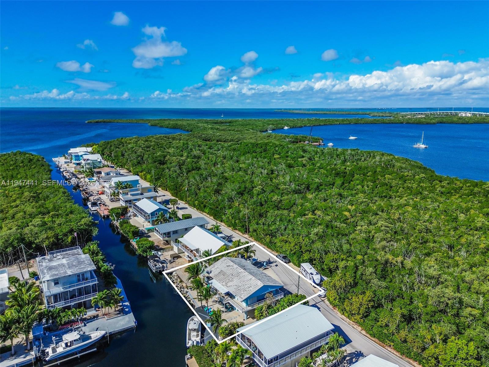 21 Mangrove Lane Key Largo, FL 33037 - Photo 41 of 48 a view of a city with lots of green space