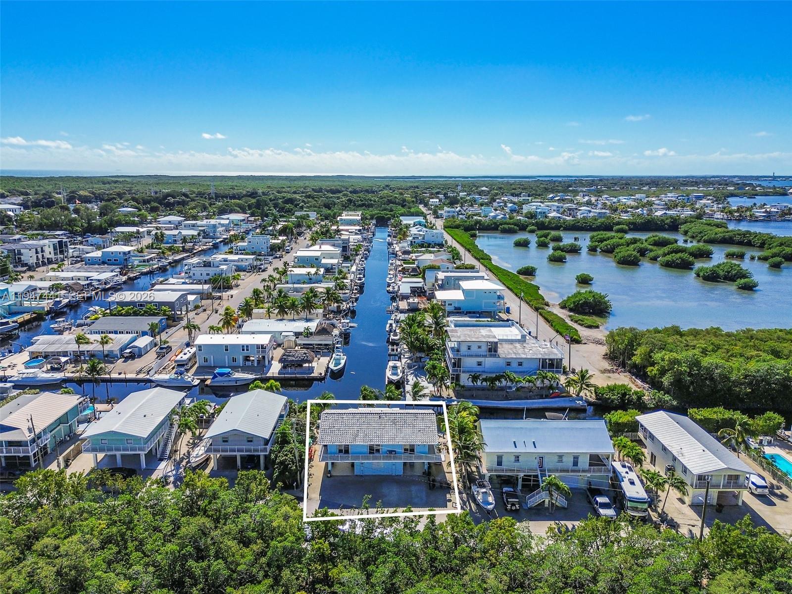 21 Mangrove Lane Key Largo, FL 33037 - Photo 43 of 48 an aerial view of a house with a garden