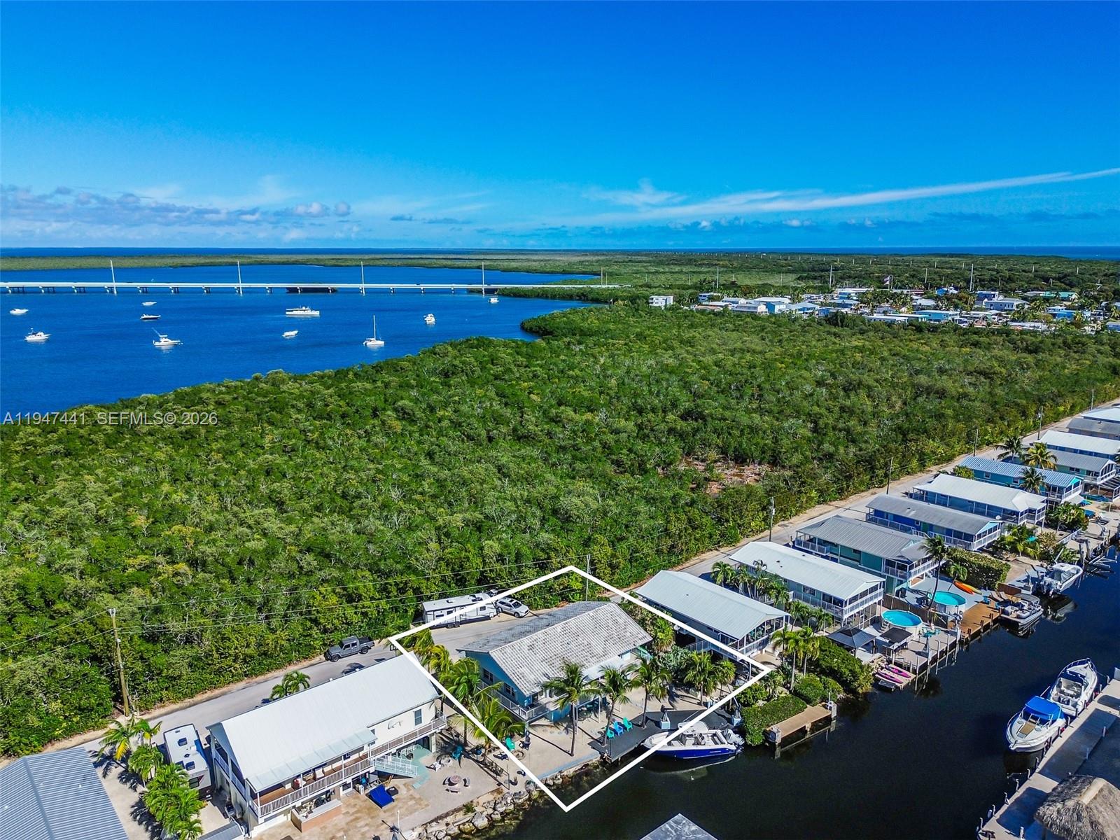 21 Mangrove Lane Key Largo, FL 33037 - Photo 45 of 48 an aerial view of a house with a garden