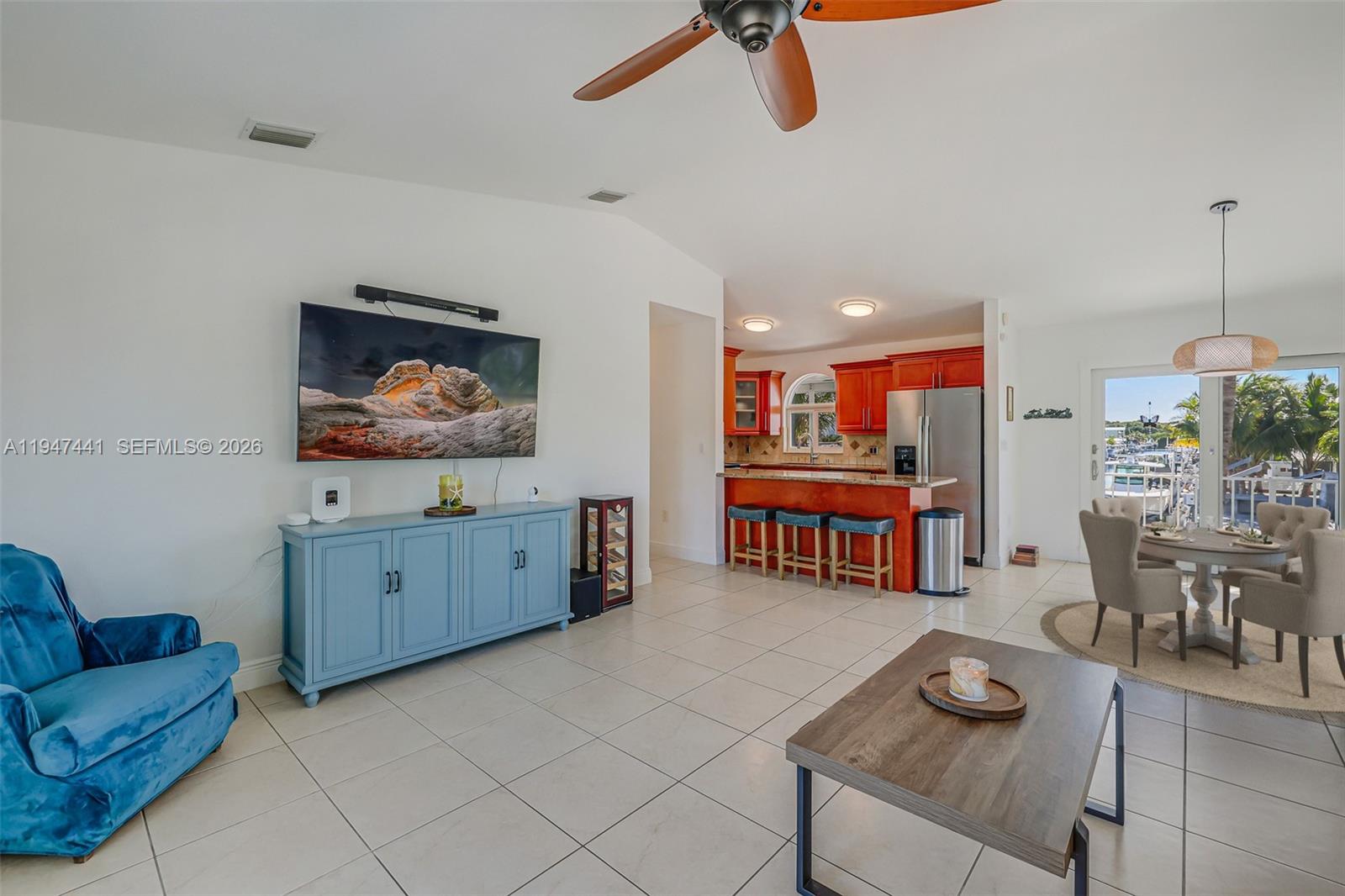 21 Mangrove Lane Key Largo, FL 33037 - Photo 6 of 48 a living room with furniture and wooden floor
