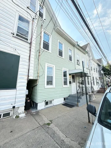 a view of a house with a patio