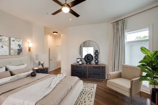 a bedroom with a bed and furniture