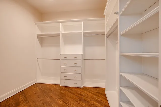 a view of an empty walk in closet