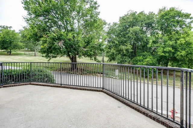 a view of a gate and fence