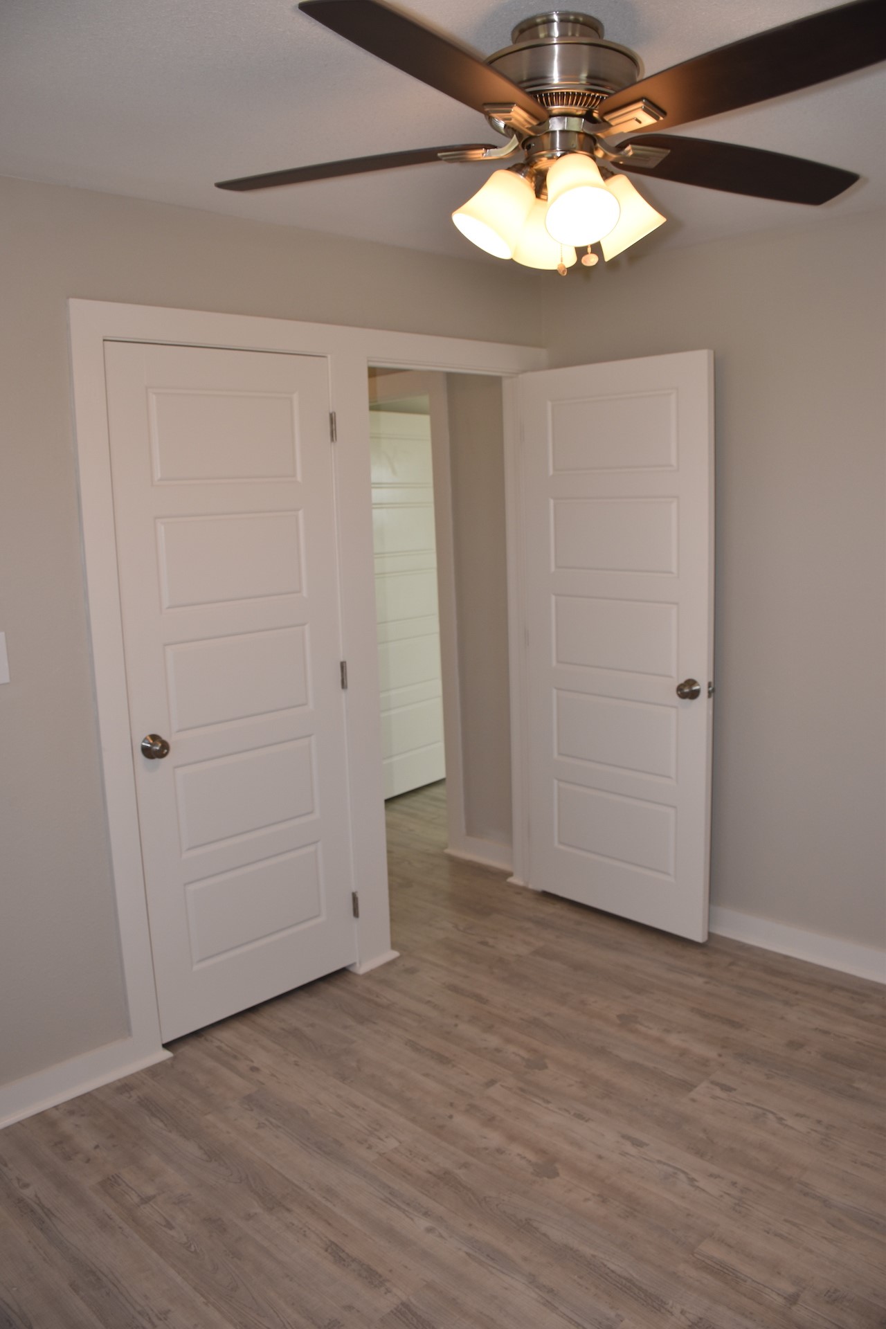 3751 County Road 463 Elgin, TX 78621 - Photo 22 of 27 a view of an empty room with a chandelier fan