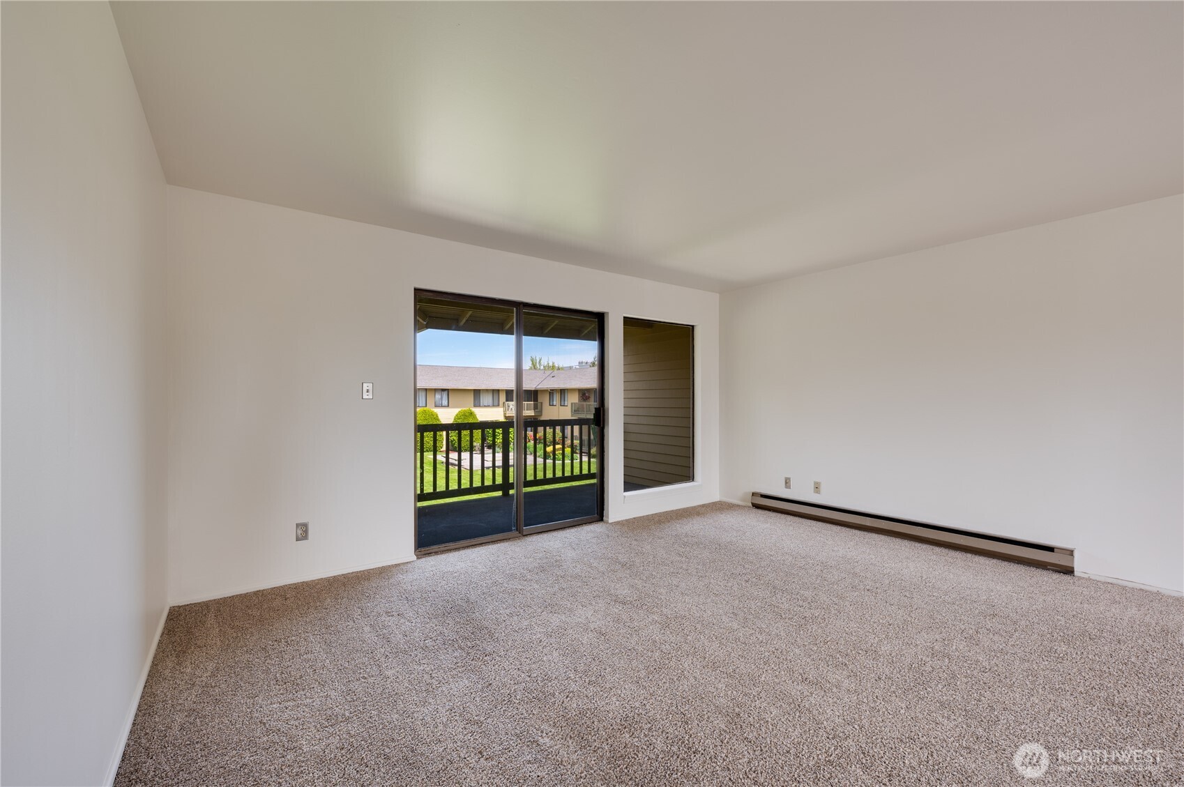 310 South 11th Street, Unit 212 Mount Vernon, WA 98274 - Photo 12 of 18 a view of an empty room with a window