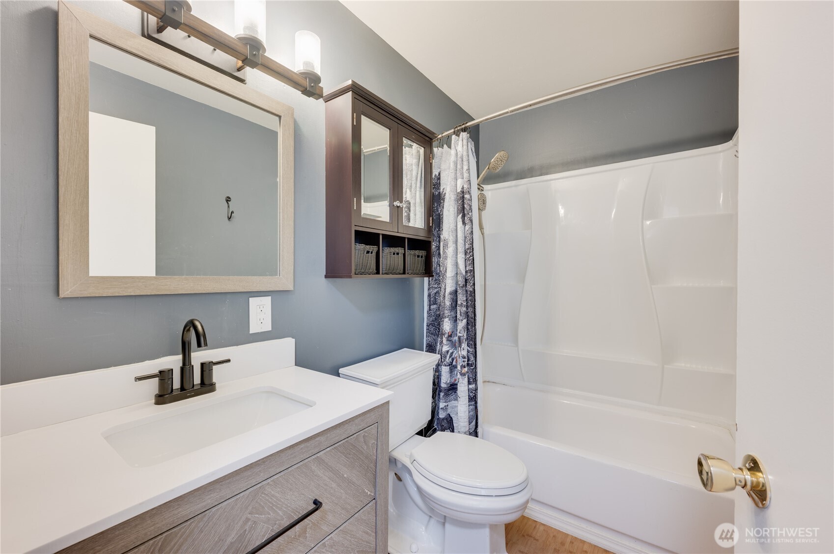 310 South 11th Street, Unit 212 Mount Vernon, WA 98274 - Photo 17 of 18 a bathroom with a sink toilet and shower