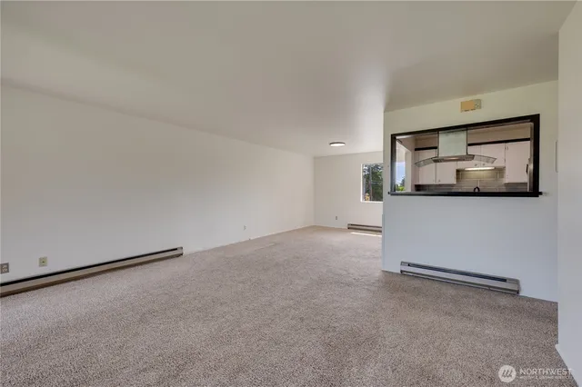 a view of a room with a large window