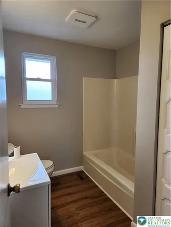 a bathroom with a bathtub