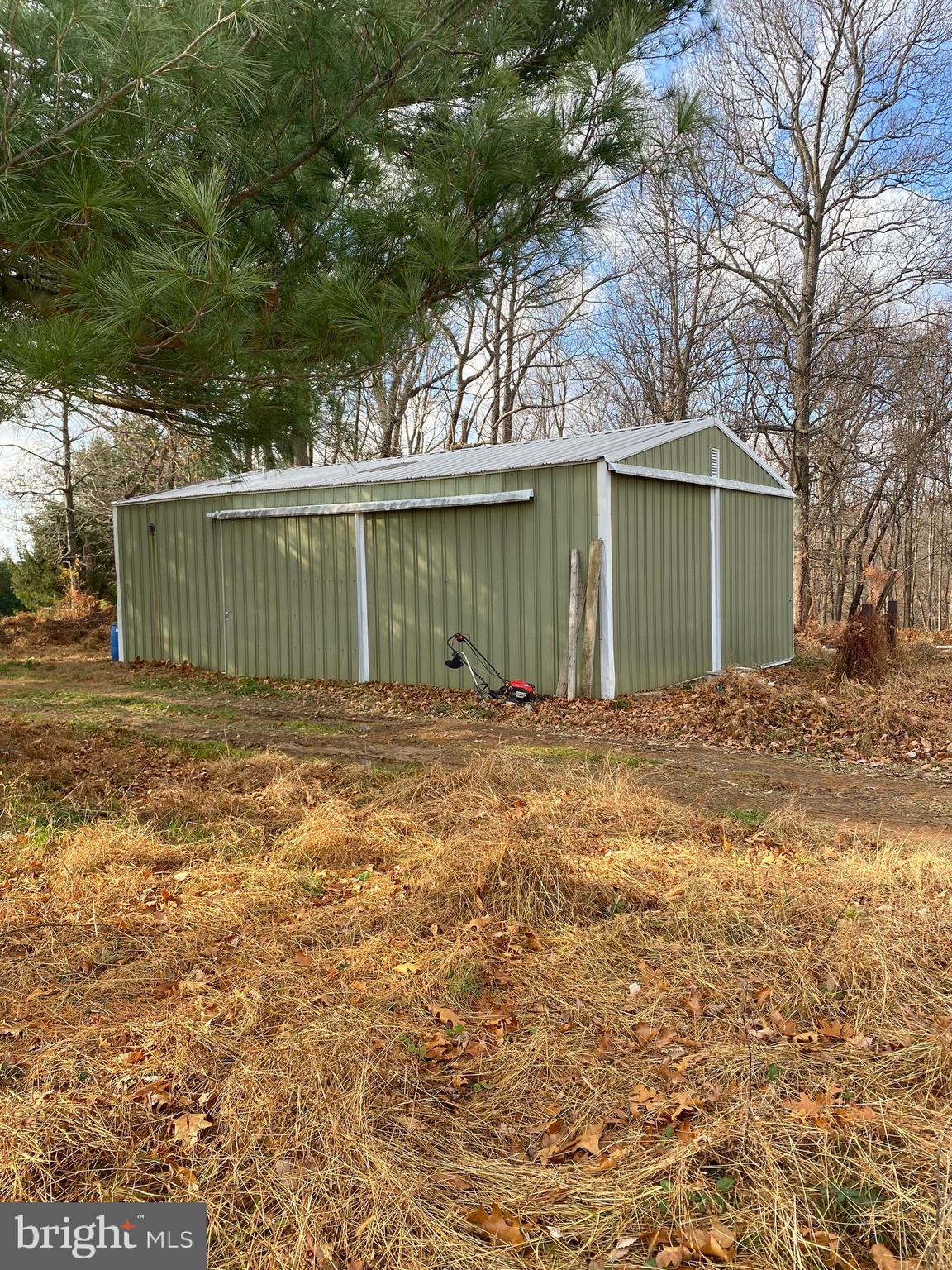17794 Old Frederick Road Mount Airy, MD 21771 - Photo 24 of 24 a front view of a house with a yard