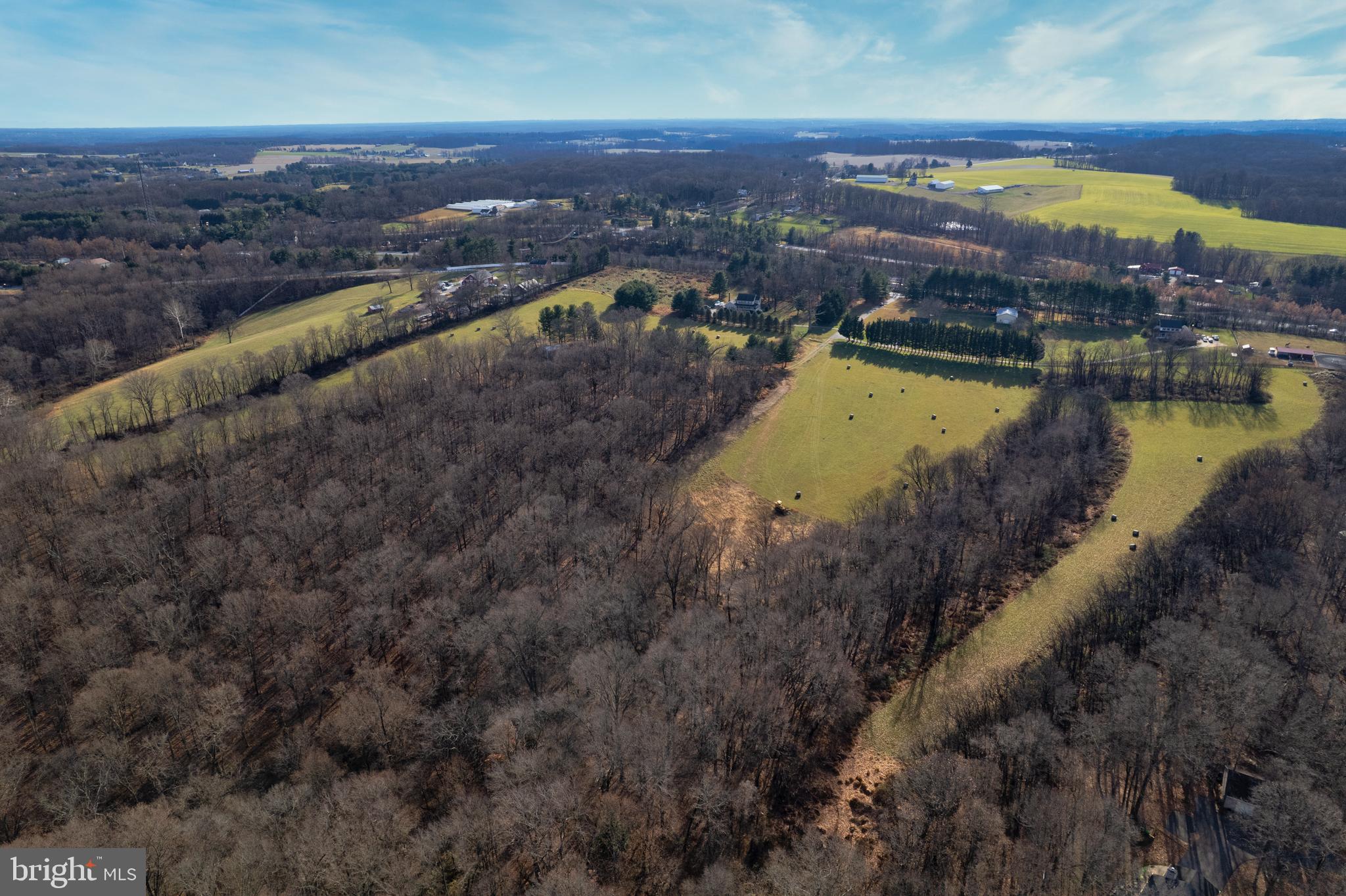 17794 Old Frederick Road Mount Airy, MD 21771 - Photo 5 of 24 an aerial view of residential houses with outdoor space and swimming pool