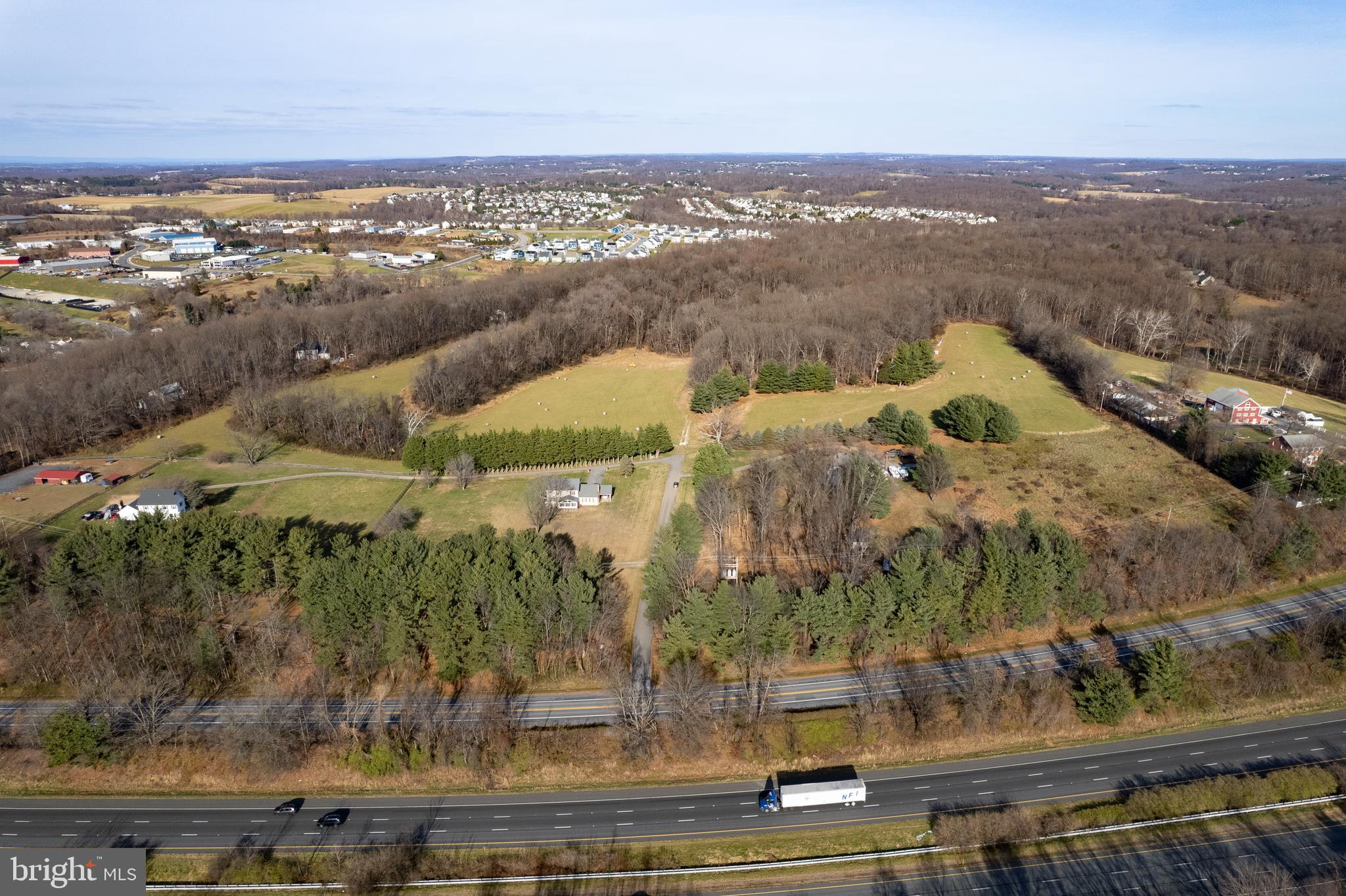 17794 Old Frederick Road Mount Airy, MD 21771 - Photo 10 of 24 an aerial view of residential houses with outdoor space