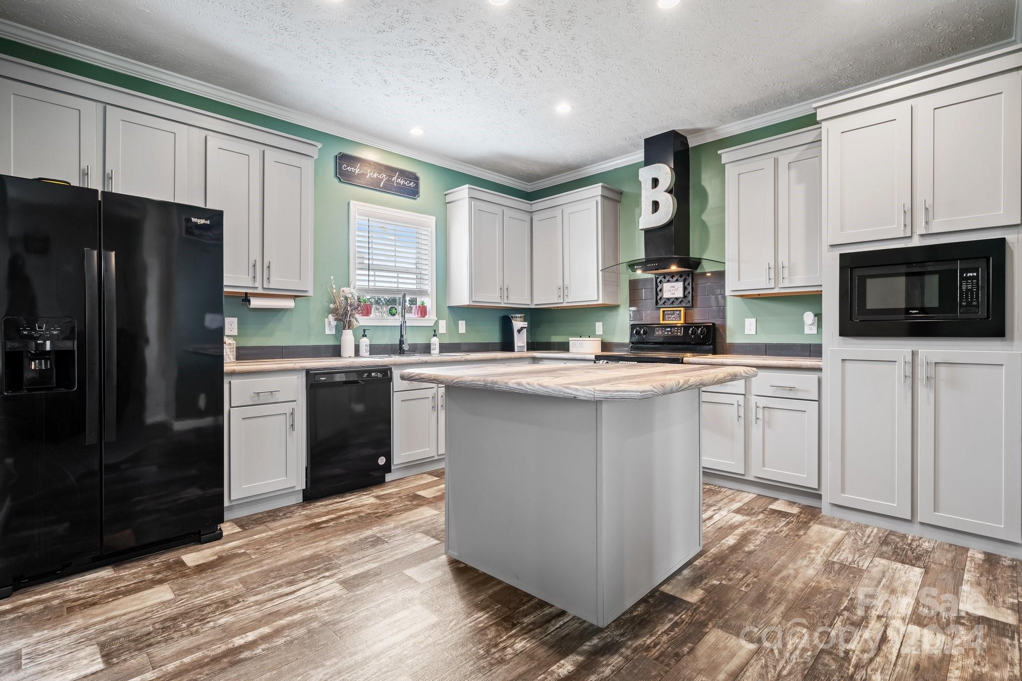 4636 Plateau Road Vale, NC 28168 - Photo 14 of 48 a kitchen with a sink stove and refrigerator