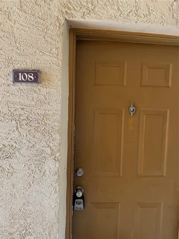 a backyard of a house with yard and garage