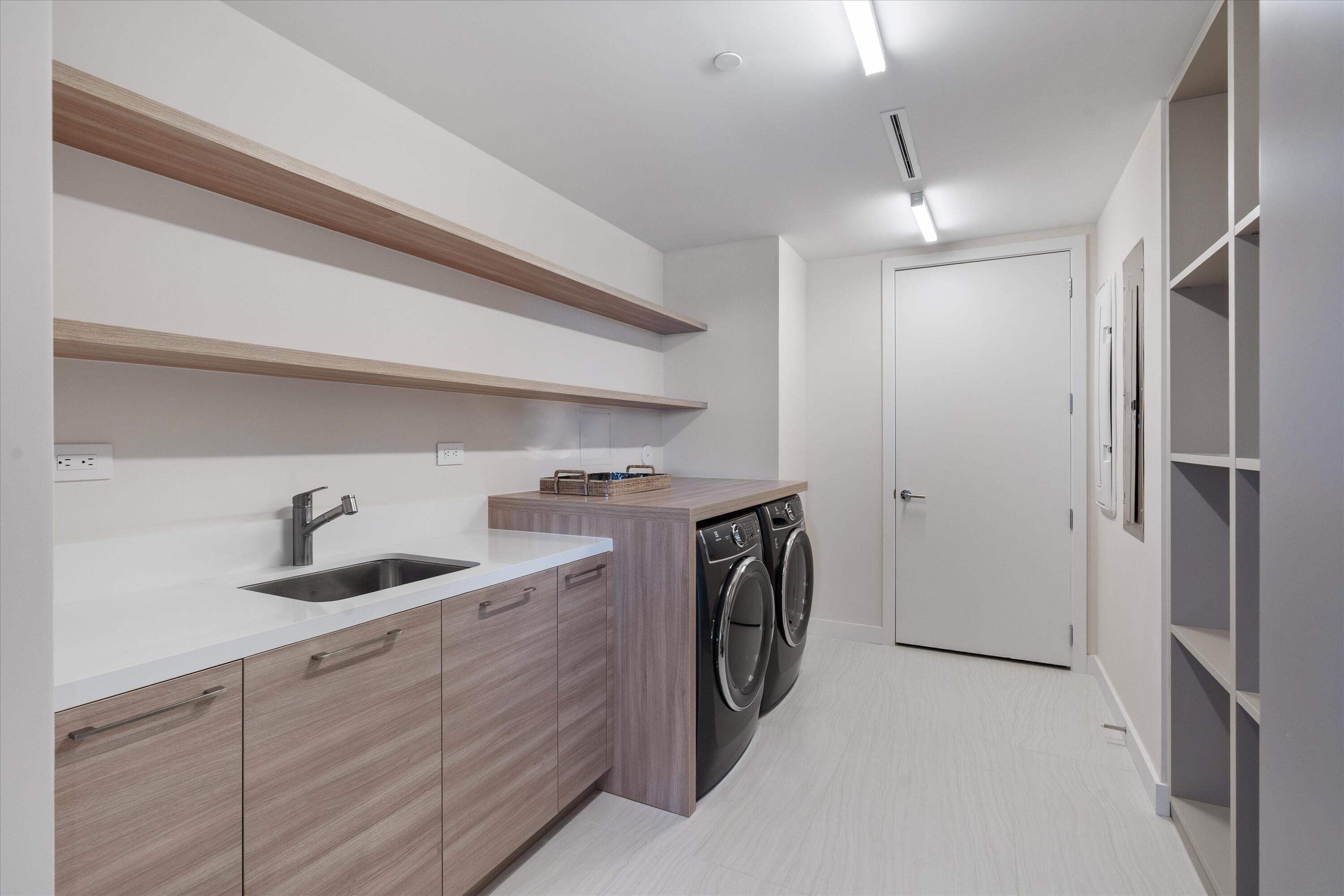 220 Southeast Mizner Boulevard, Unit 604 Boca Raton, FL 33432 - Photo 22 of 52 Pantry & Laundry Room