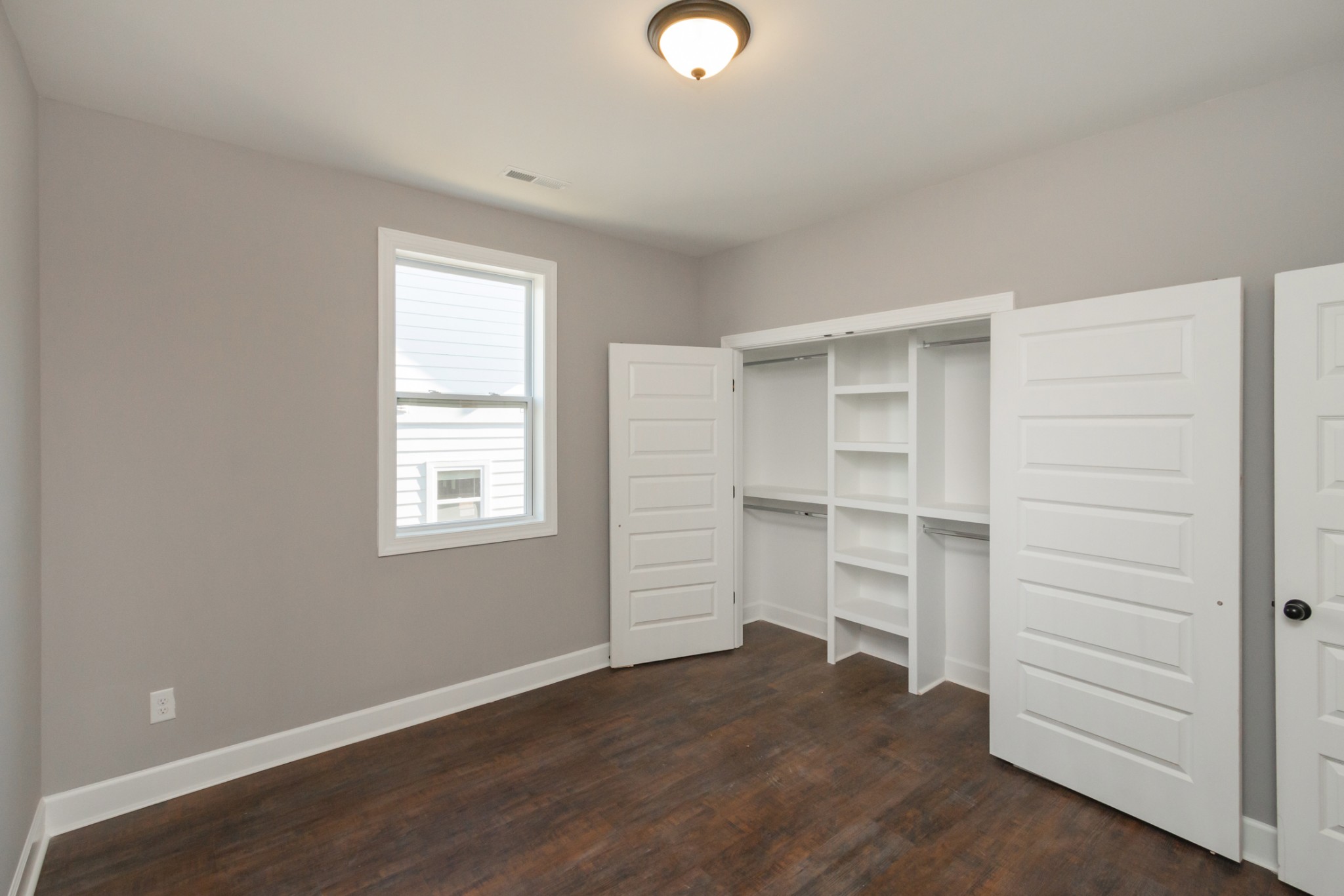 4351 Goins Road Nashville, TN 37211 - Photo 36 of 53 a view of walk in closet with empty racks