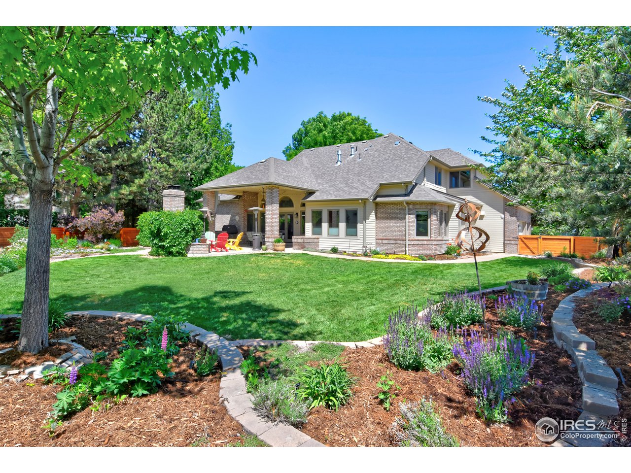 1301 Ruby Way Longmont, CO 80504 - Photo 21 of 37 Lush Backyard with Plenty of Privacy