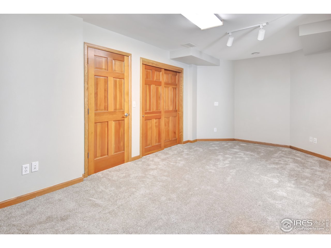 1301 Ruby Way Longmont, CO 80504 - Photo 31 of 37 Large 5th Bedroom with Dual Closets